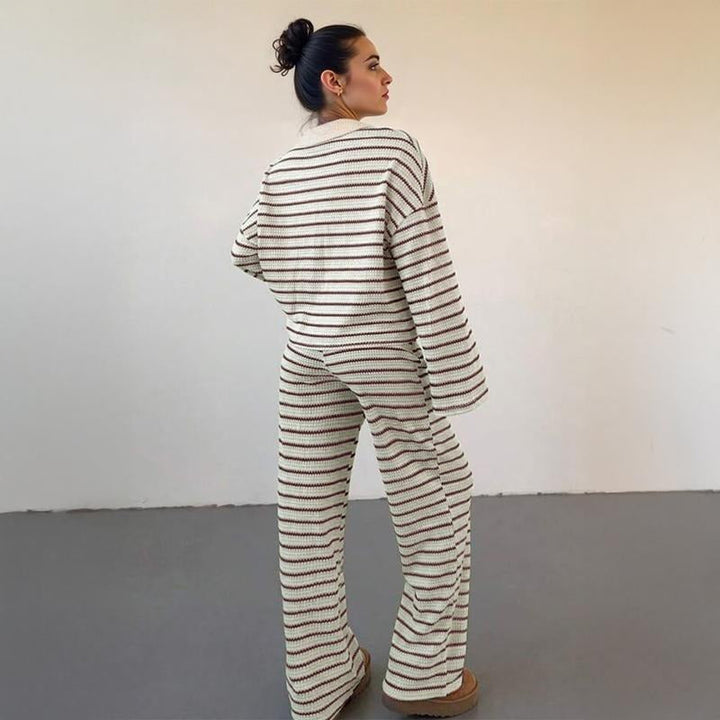 Woman wearing a cozy striped knit lounge set, a comfortable two-piece cotton blend for home or casual outings.