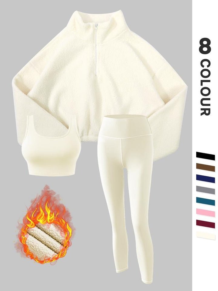Women's cozy thermal fleece activewear set. Warm sculpting leggings, pullover & supportive bra for winter workouts.