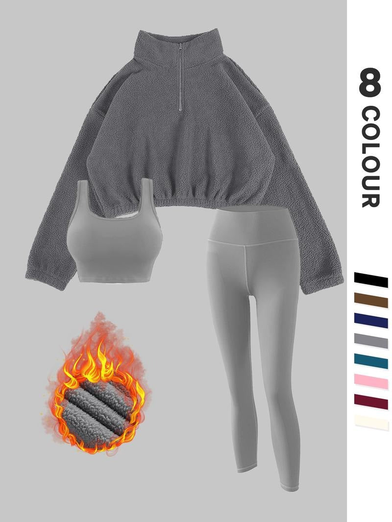 Women's thermal fleece sportswear set; sculpting leggings & warm pullover ideal for active winter sports and comfort.