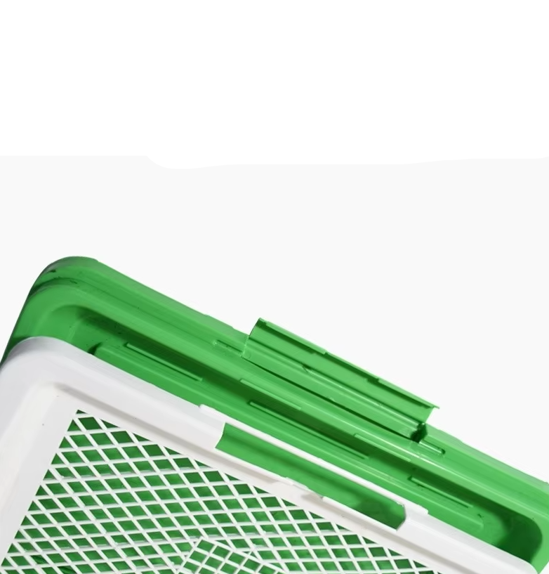 Puppy training aid: an indoor/outdoor dog potty with realistic artificial grass, durable & weather-resistant.