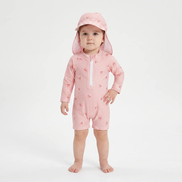Toddler long-sleeve rash guard swim set for boys/girls, UPF 50+ sun protection, includes matching hat. Beach ready.