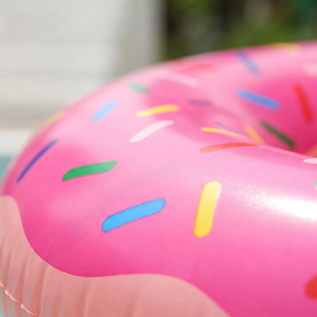 Relax on this large unisex inflatable donut pool float. A perfect swim ring for summer fun & pool parties.