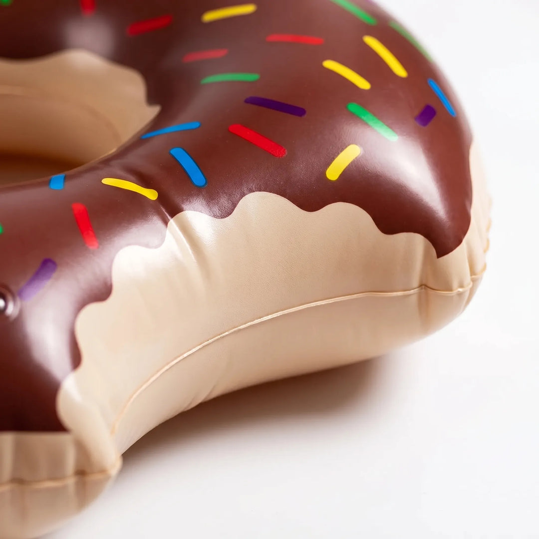 Durable PVC inflatable donut pool float with realistic frosting design for endless summer water fun.