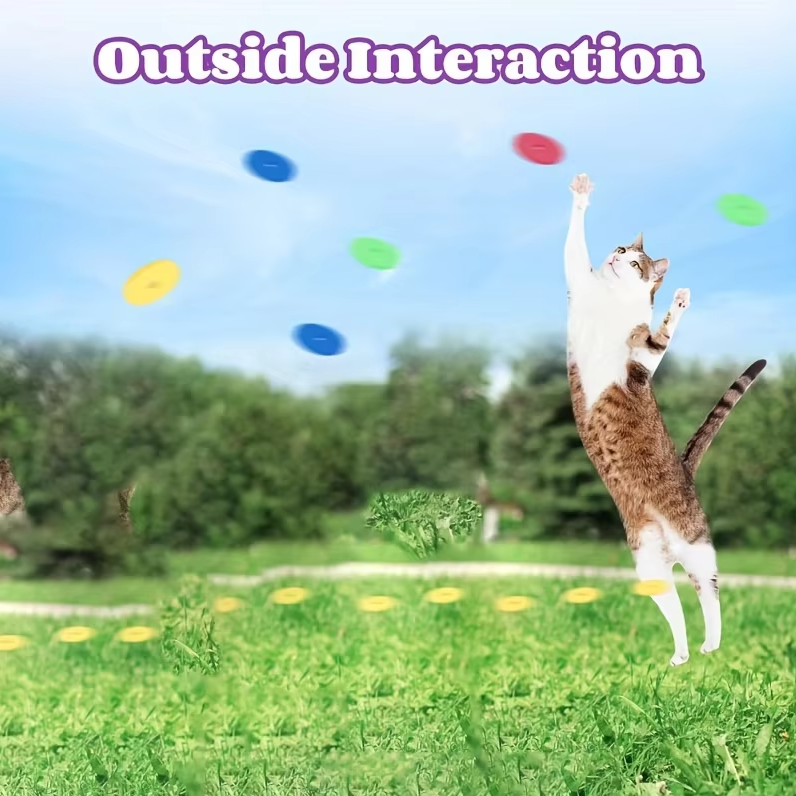 Child laughing while using Interactive Cat Disc Launcher Toy with their pet cat
