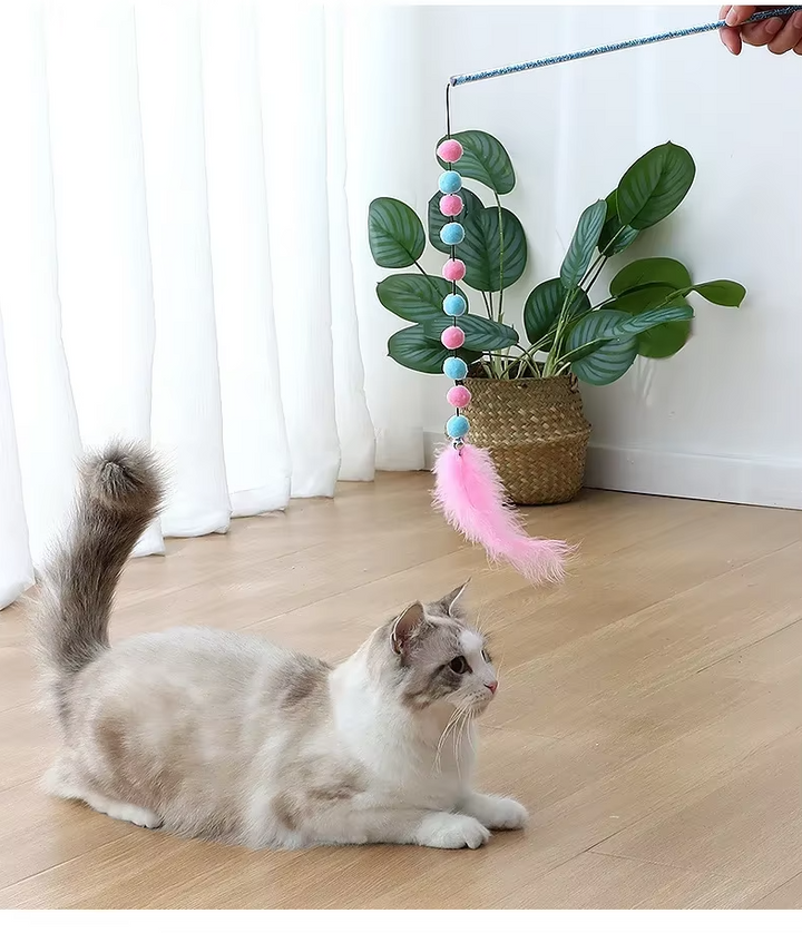 Ergonomic handle of a unisex cat fishing rod toy, designed for comfortable grip during interactive feline enrichment