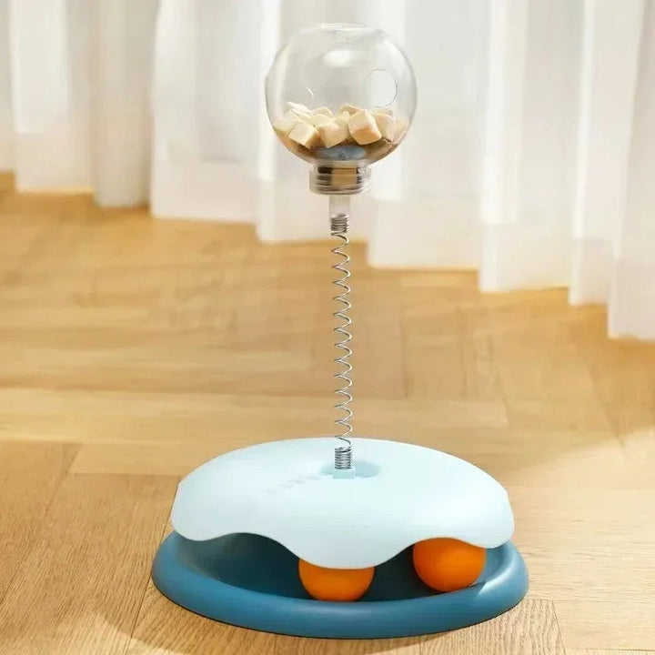 Interactive cat food dispenser tumbler toy for mental stimulation and slow feeding, durable pet feeder.