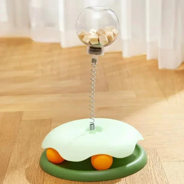 Kitten interactive food dispenser, a yellow tumbler toy for slow feeding and enrichment activity.