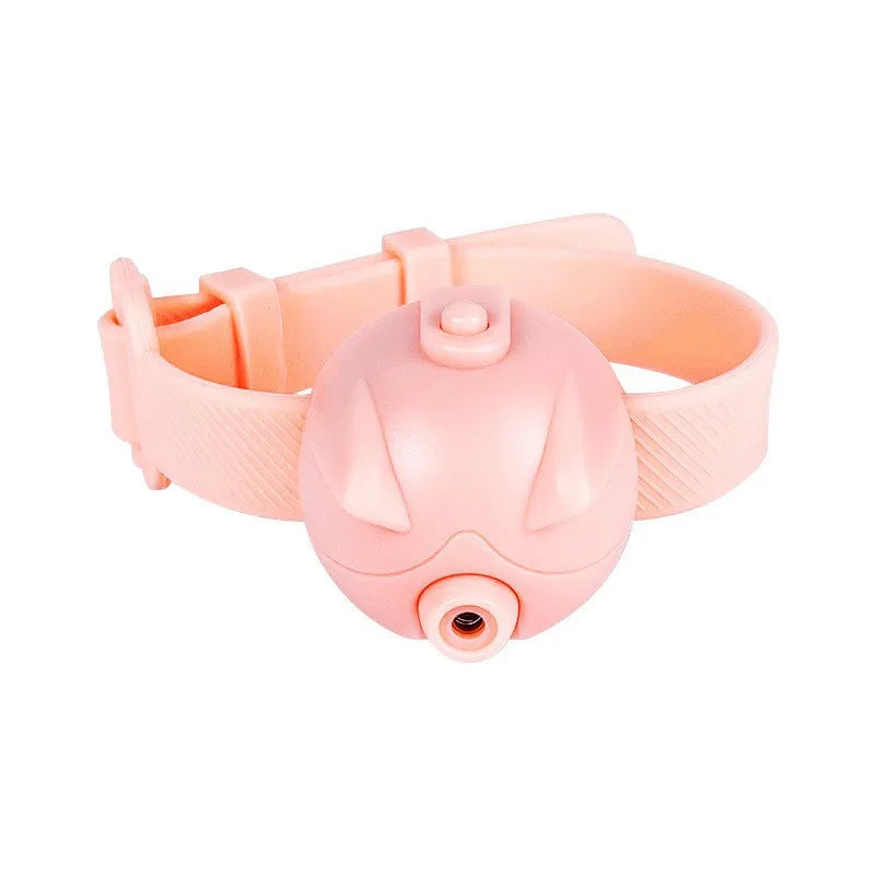 Happy cat pouncing on a laser dot from an interactive pet toy, perfect for daily cat activity