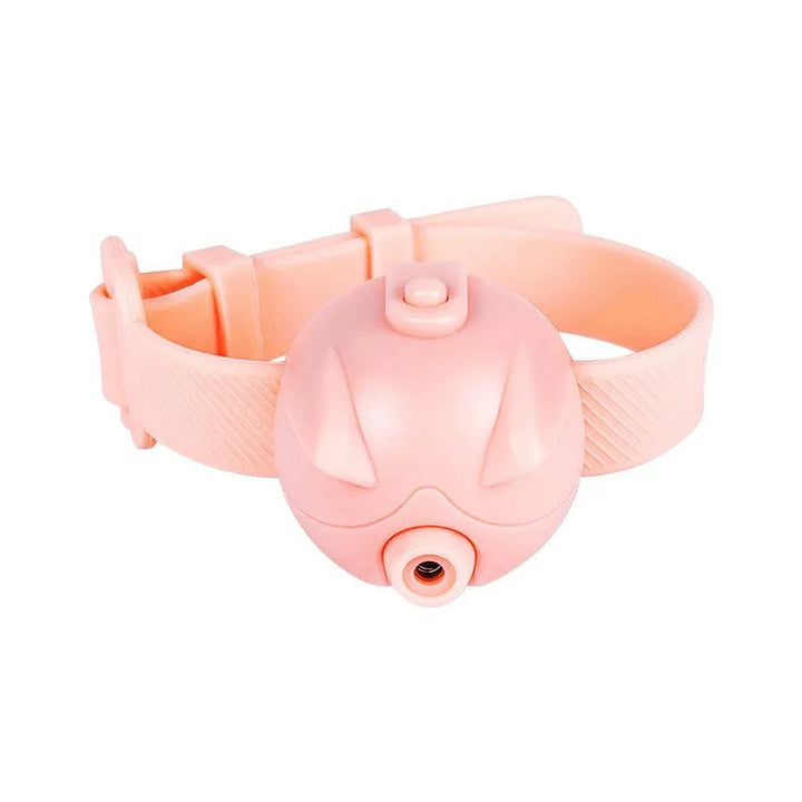 Happy cat pouncing on a laser dot from an interactive pet toy, perfect for daily cat activity