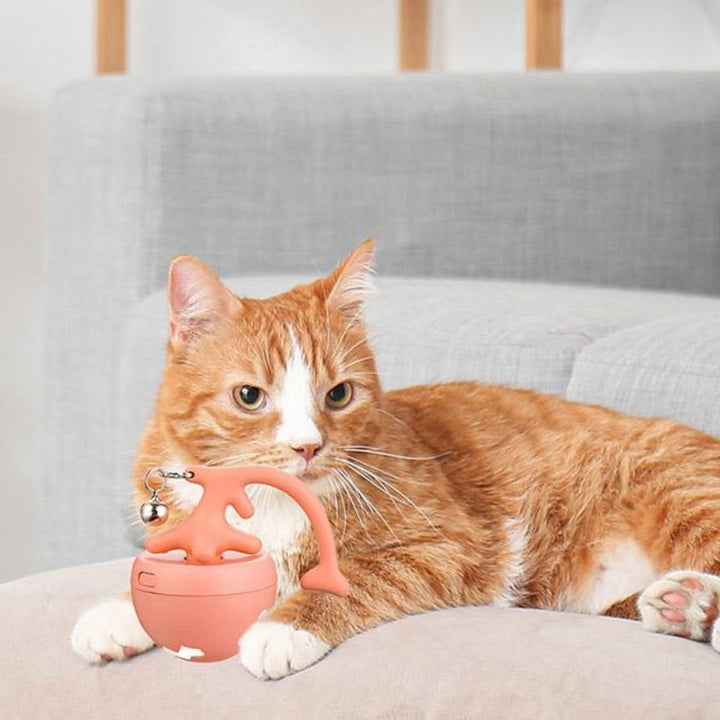 Interactive cat play ball with colorful feathers for engaging pet playtime.