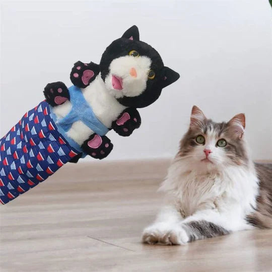 Cat pouncing on interactive play glove, fun and engaging pet supplies for felines