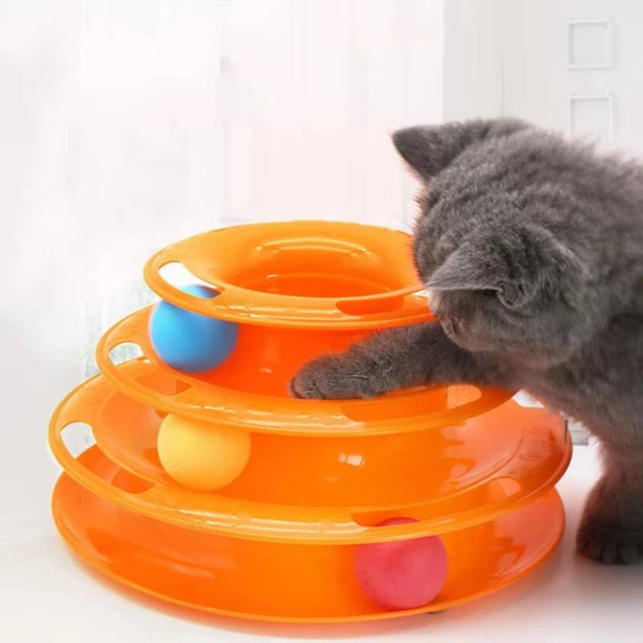 Multi-layer pet play tower for cats, featuring engaging toys and durable construction for kittens