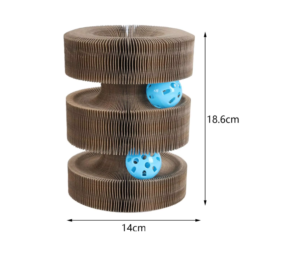Cat enjoying a playful session with the interactive scratching tower and its attached ball toy.