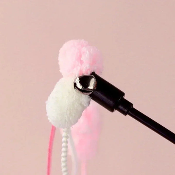 Cat toy teaser wand with a fluffy tassel and bell, designed for pet bonding and active interactive play