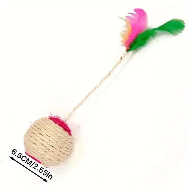 Close-up of an interactive cat toy ball with a fluffy feather and durable sisal rope texture.