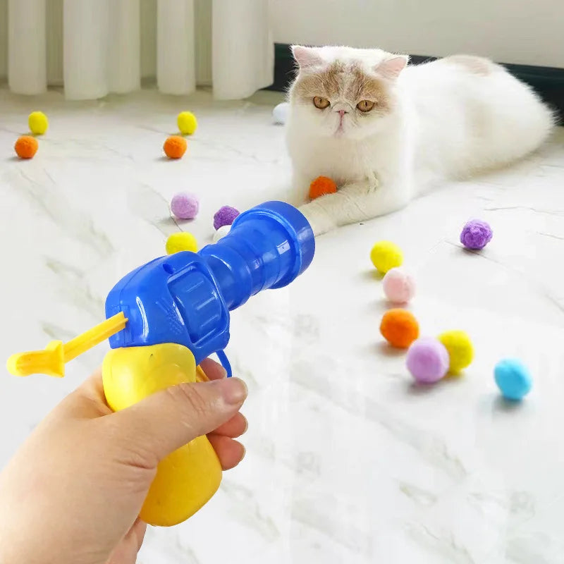 Interactive Cat Toy Cannon, launching a soft ball for feline playtime enrichment