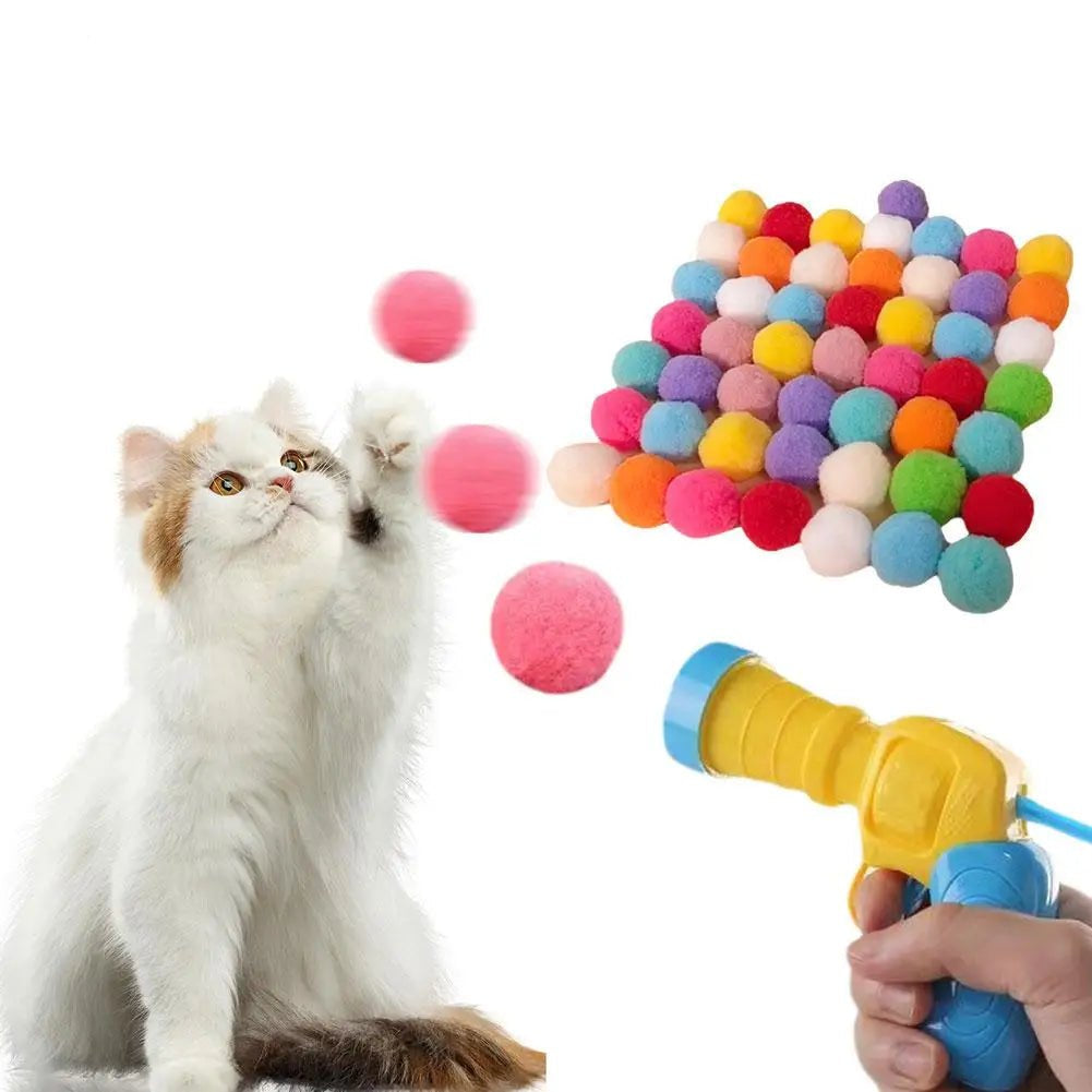 Interactive cat toy launch gun with three colorful plush balls, perfect for indoor cat exercise and playtime