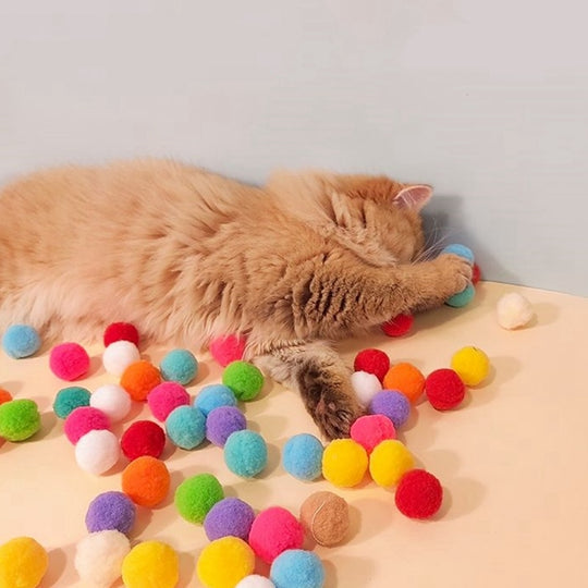 Set of soft plush balls for cat toy launcher gun, ideal for stimulating pet exercise.