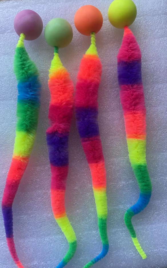 Gift idea: Interactive cat toy, plush tail & ball combo, ensures hours of fun for cats.
