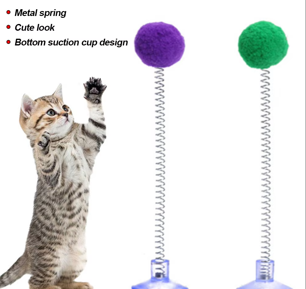 Suction cup feather wand cat toy for engaging and independent feline enrichment sessions.