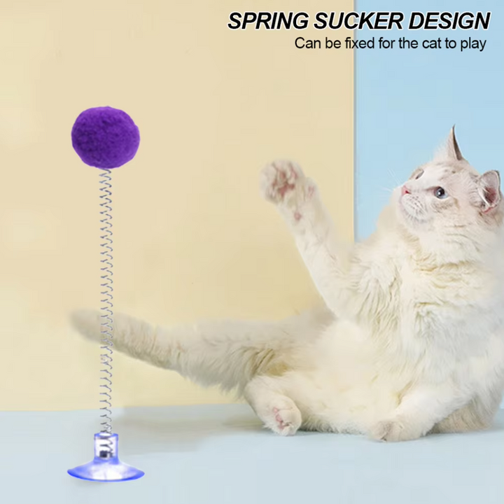 Feather wand cat toy with strong suction cup base, promoting active playtime for cats.