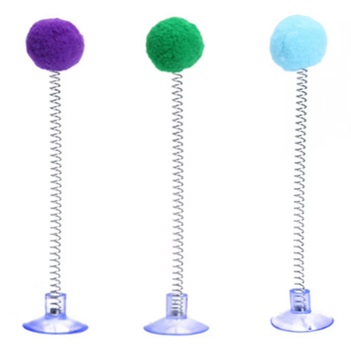 Engaging interactive cat toy; a feather wand on a secure suction cup base for active felines.