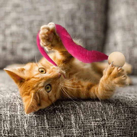 Pet supplies: interactive cat toy with safe materials, intriguing bell, and engaging wagging tail