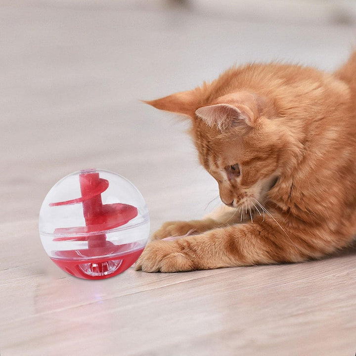 Pet supplies: Orange interactive cat treat dispenser ball, puzzle toy for food, mental stimulation.