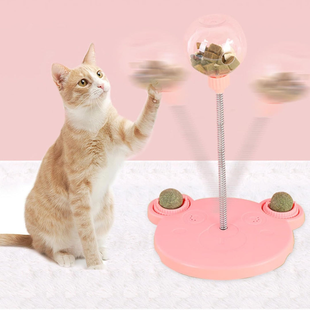 Cat play treat dispenser, a pet supply for enrichment, releases treats during playtime.