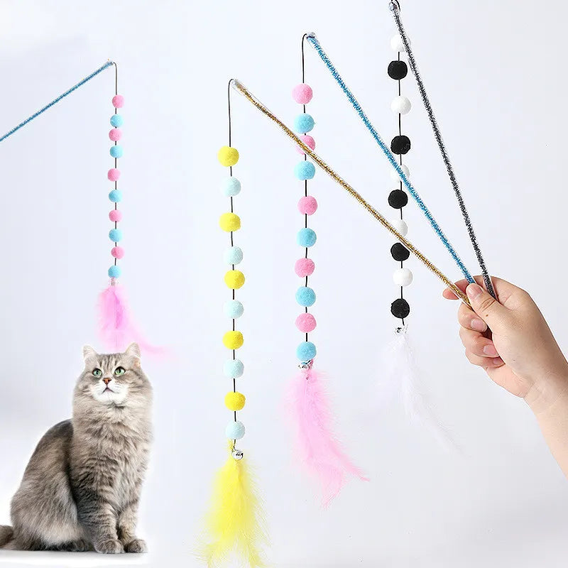 Cat wand toy featuring vibrant pompoms and natural feathers, designed for active cat enrichment.