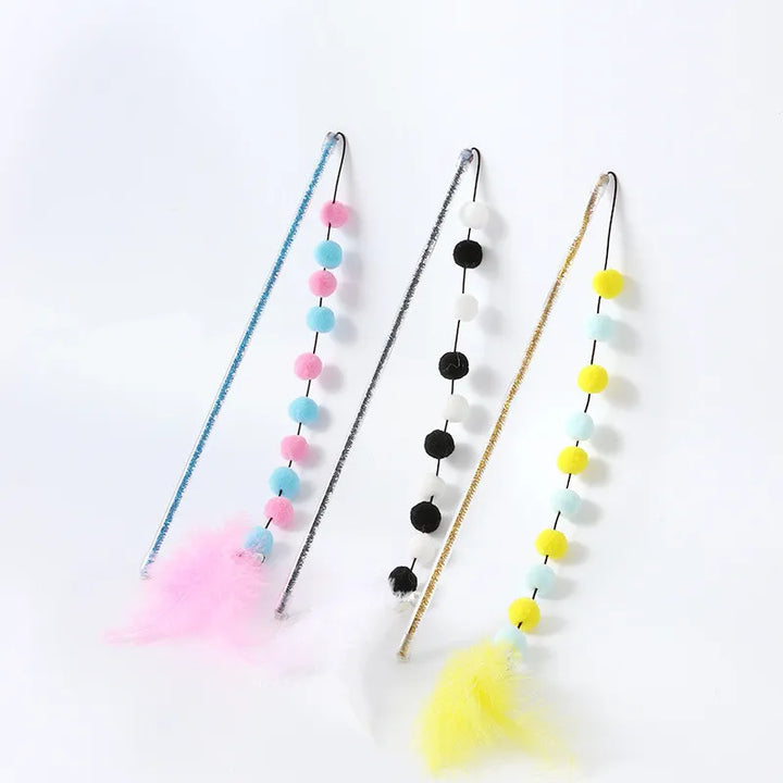 Long interactive cat wand toy showcasing feathery and pompom attachments for stimulating pet playtime.