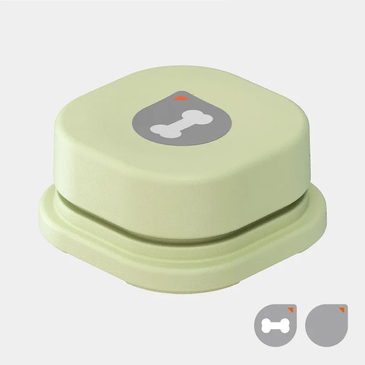 Pet owner demonstrating interactive dog communication buttons for effective pet communication