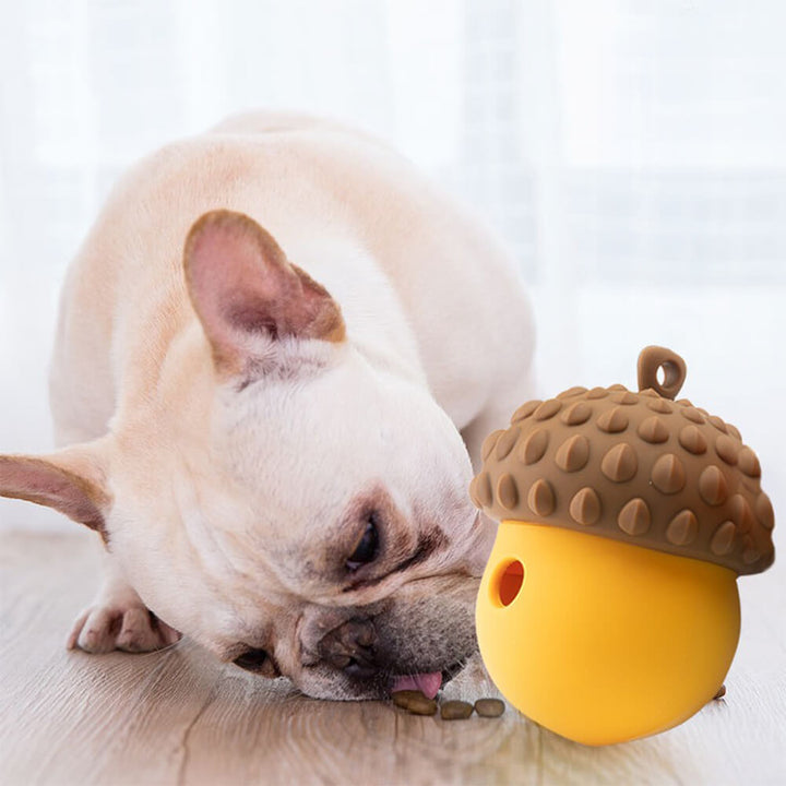 Interactive dog slow feeder toy, blue silicone, with food dispensing holes for pet enrichment