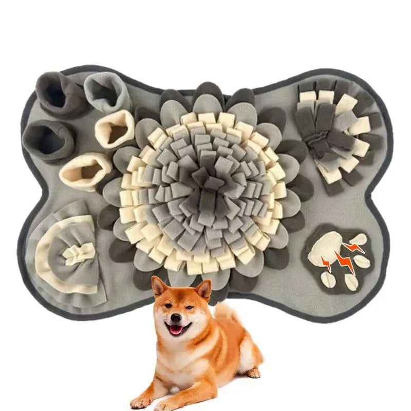 Snuffle mat dog toy with hidden treats, encouraging nosework and healthy slow feeding habits.