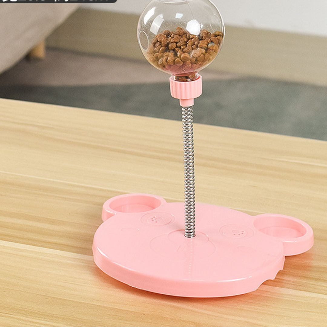 Interactive dog toy wiggling on floor, dispensing treats for pet enrichment