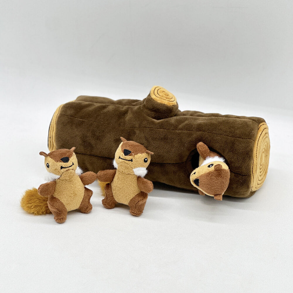 Brown plush tree trunk interactive dog puzzle toy with squirrels peeking out for enrichment