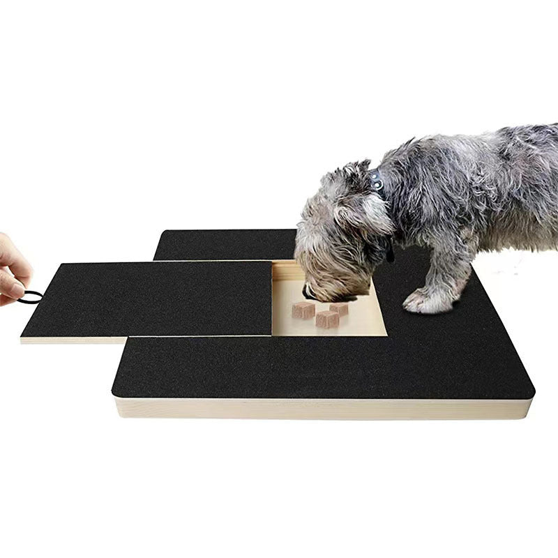 Dog enjoying treat play mat, a calming pet supply for positive nail trimming experiences