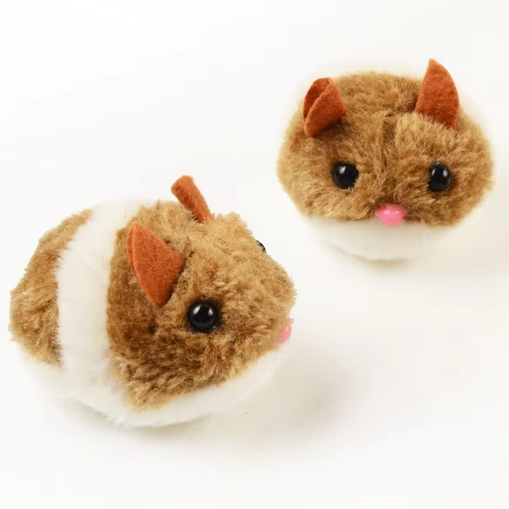 Cat playing with an electric hamster toy, enhancing playtime and exercise
