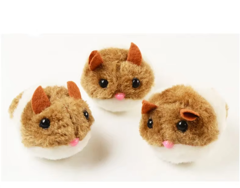 Cat batting an interactive electric plush hamster toy for exercise