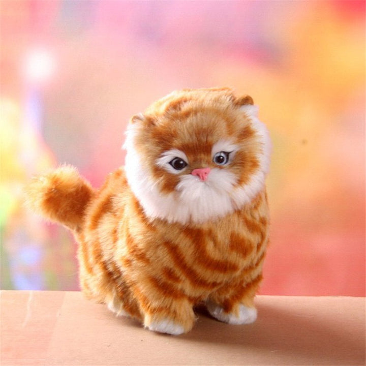 Detailed electric plush kitten, interactive with realistic meows & purrs, a fun pet simulation toy for kids.
