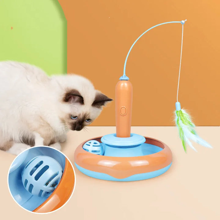 Close-up of an interactive cat toy featuring a plush ball and natural feathers.