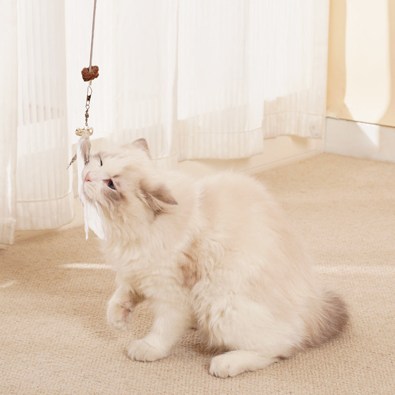 Hanging cat treat dispenser, an enriching interactive toy designed for feline engagement