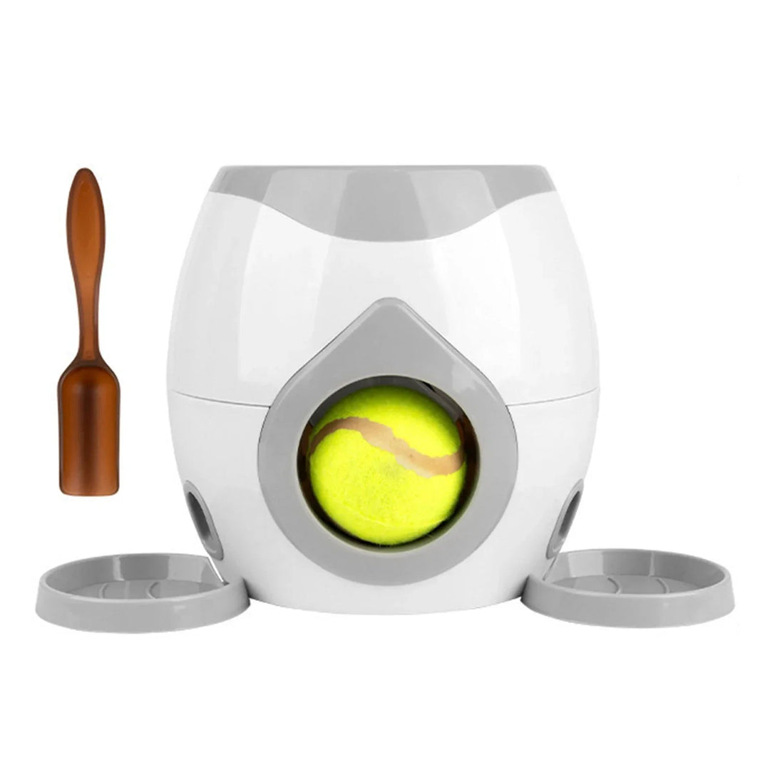 Dog looking excitedly at the Interactive Pet Ball Launcher, an automatic fetch dog toy