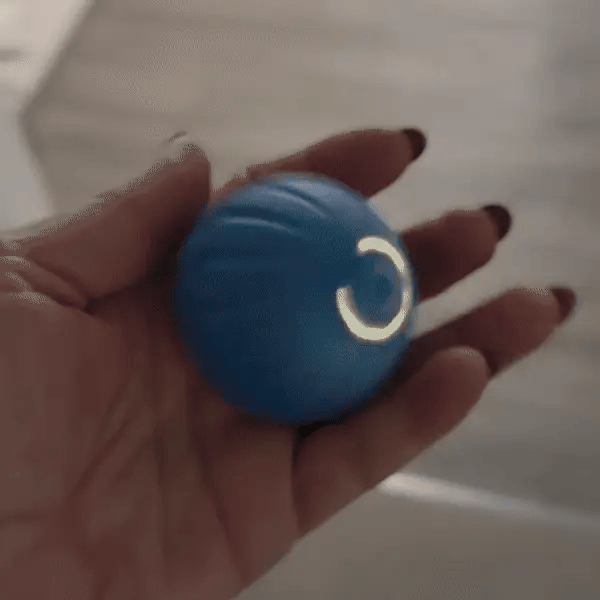 Glowing interactive pet ball, provides stimulating play for cats & dogs