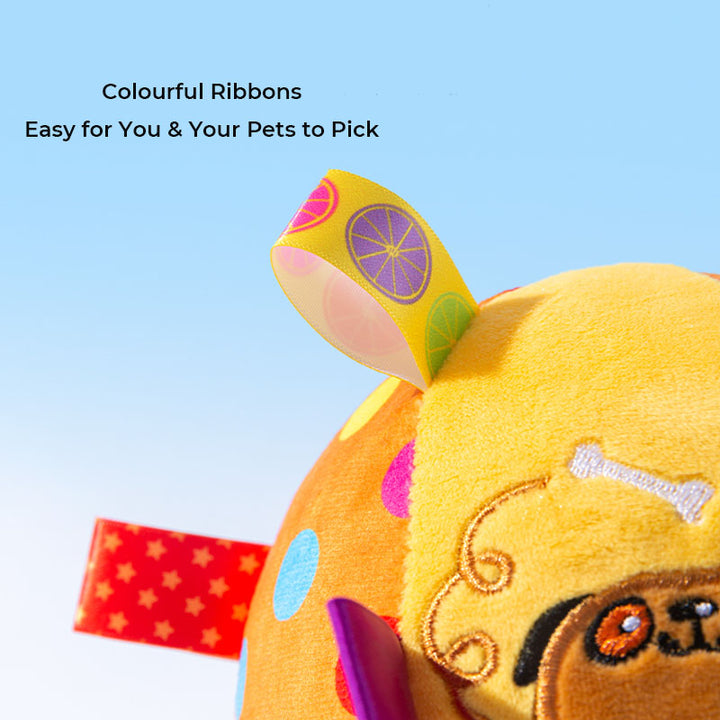 Squeaky ball dog toy designed for interactive play, soft plush texture with a joyful animal pattern.