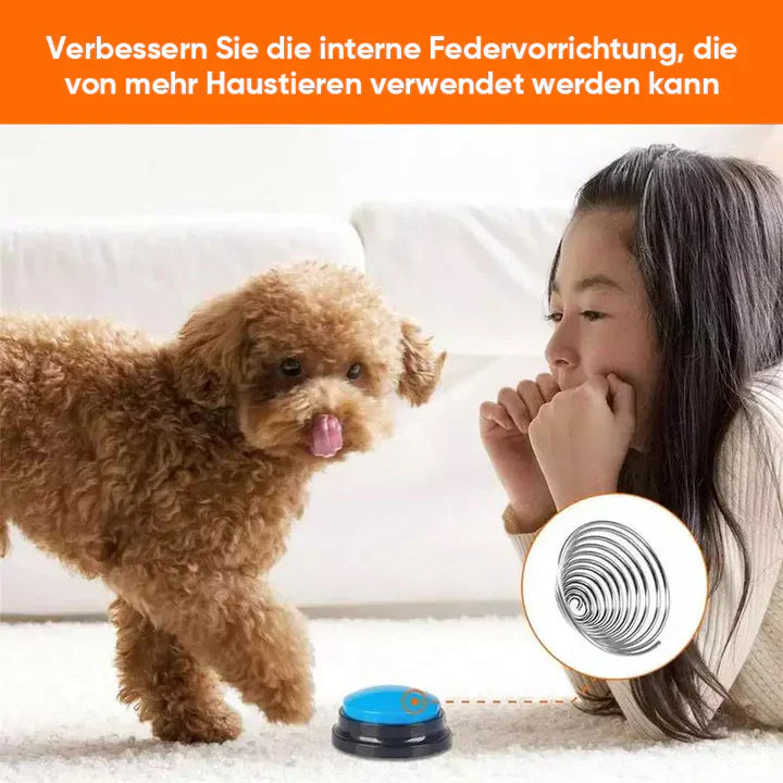 Close-up of interactive pet training button with clear label