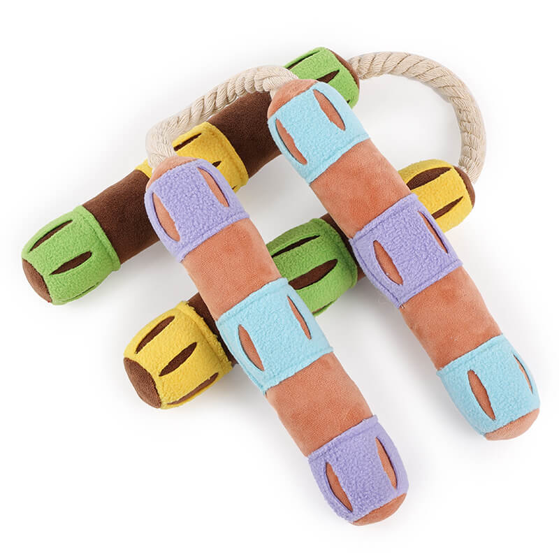 Durable interactive dog toy with puzzle compartments for dispensing treats and squeaker.