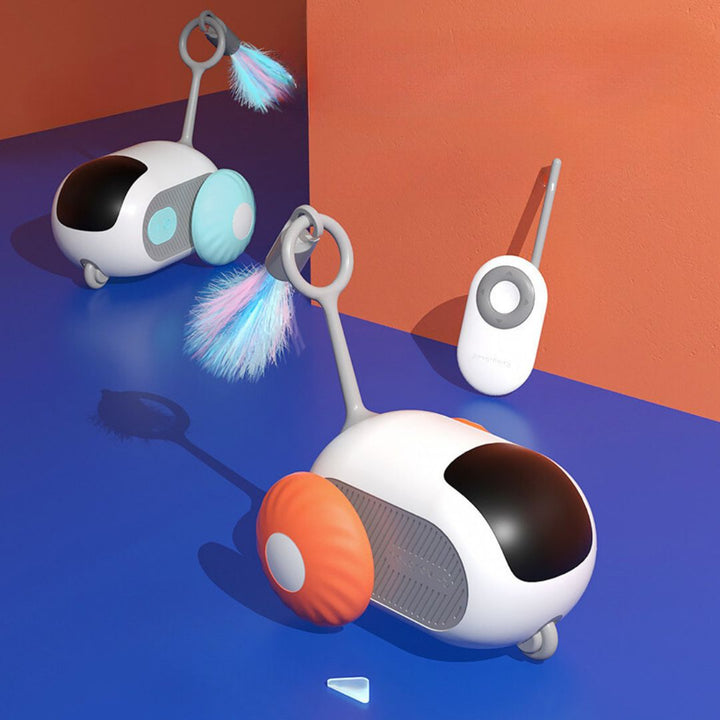 Interactive cat toy, operated by remote, with feathers attached, stimulating a cat's hunting instincts.