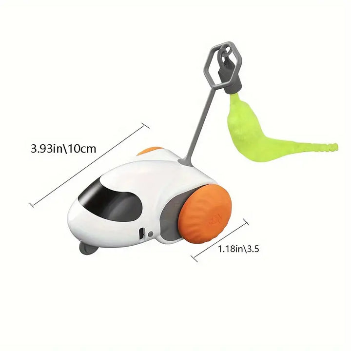 Hand holding a remote control, operating an interactive cat toy, demonstrating easy pet enrichment.