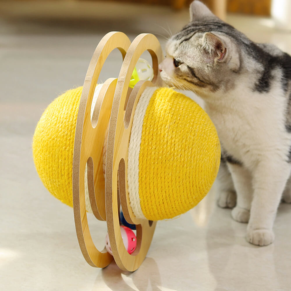 Dynamic shot of an interactive sisal scratching ball cat toy with its wooden frame and jingle ball feature